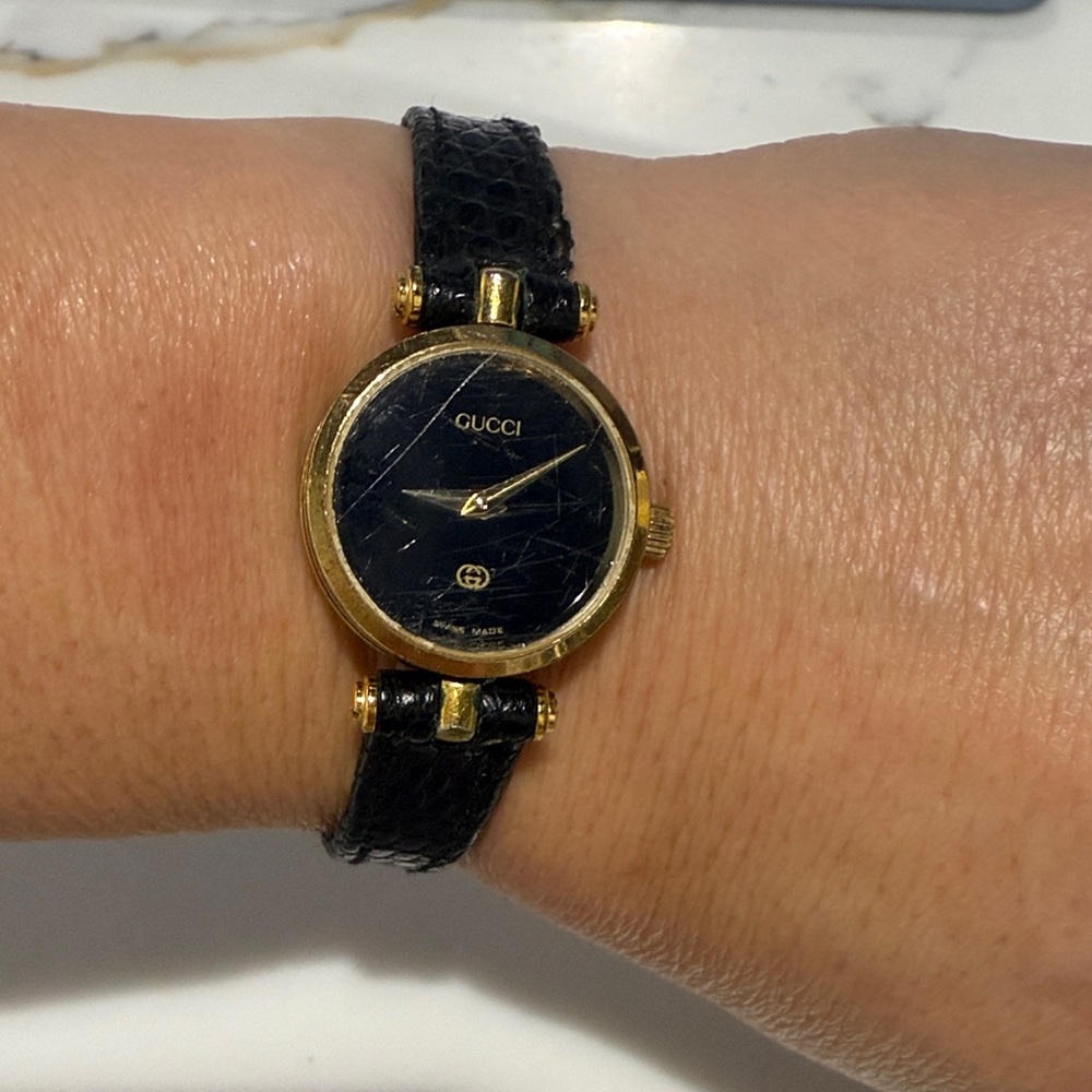 Gucci Gold and Black Leather Watch